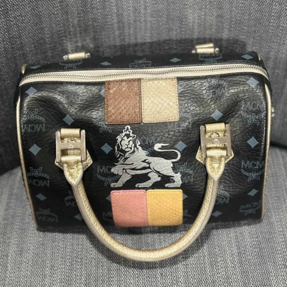 MCM Lion Visetos Boston Satchel Black Gold Leather Bag